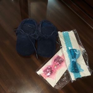 Blue baby shoes with head bands.